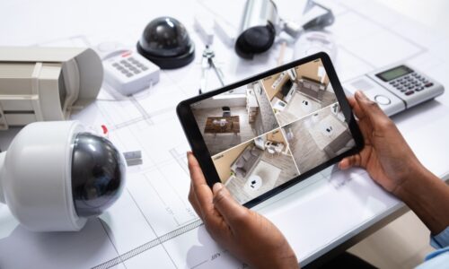Home security study surveillance footage surrounded by cameras and doorbells and smart locks